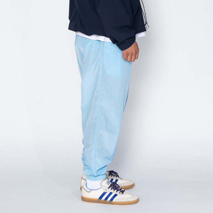 APPLEBUM（アップルバム）トラックパンツ ライトブルー 右向き