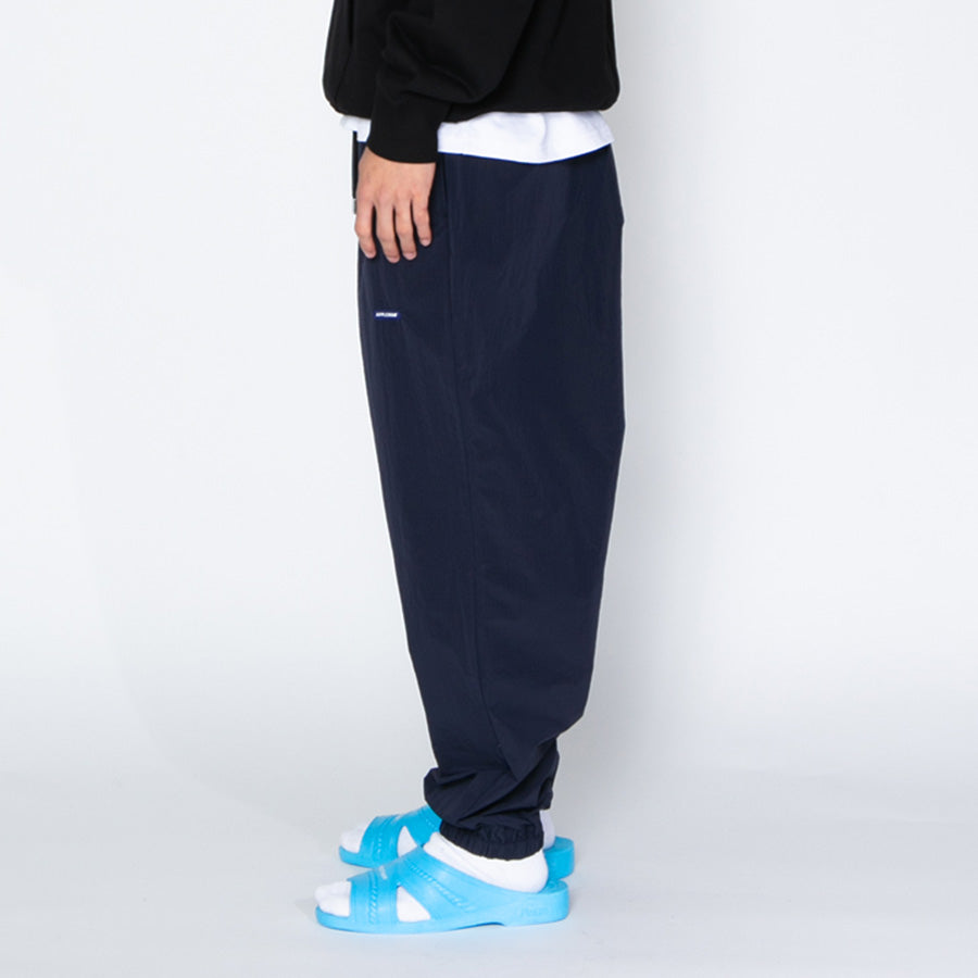 APPLEBUM（アップルバム）トラックパンツ ネイビー 左向き