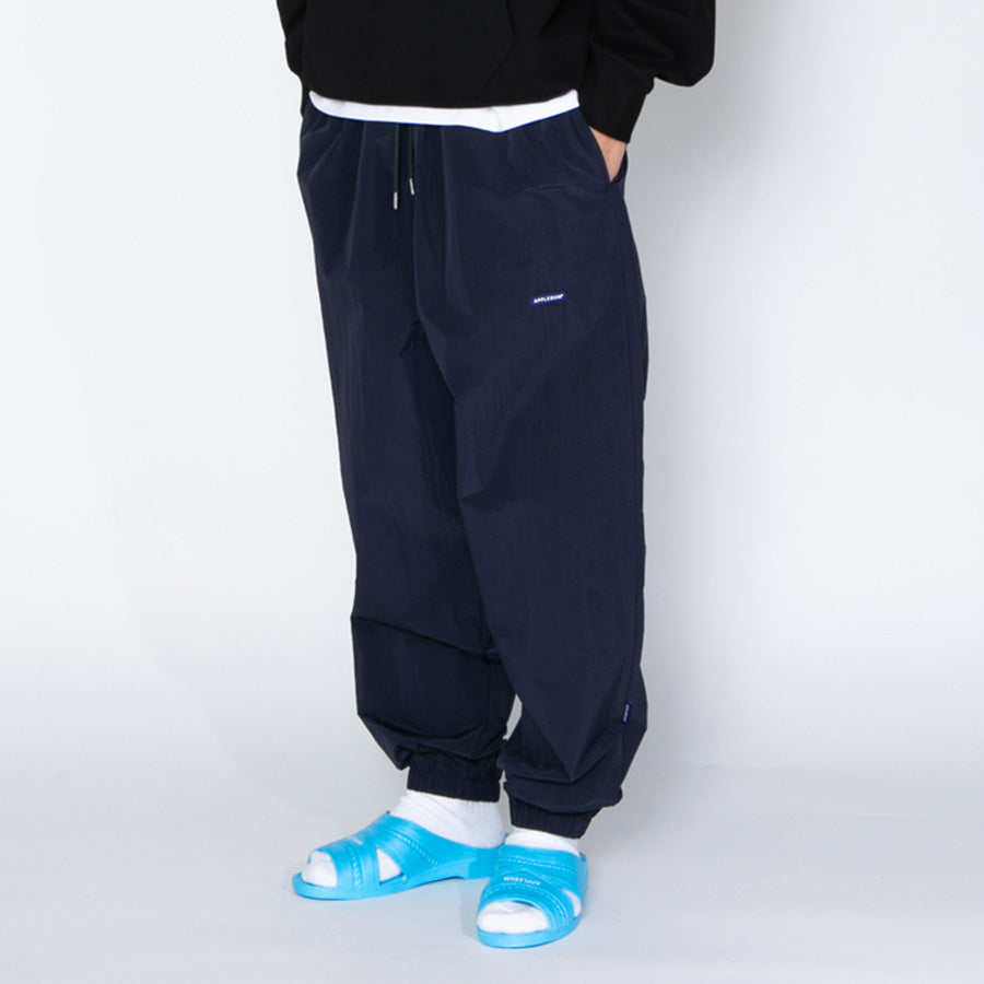 APPLEBUM（アップルバム）トラックパンツ ネイビー 左斜め