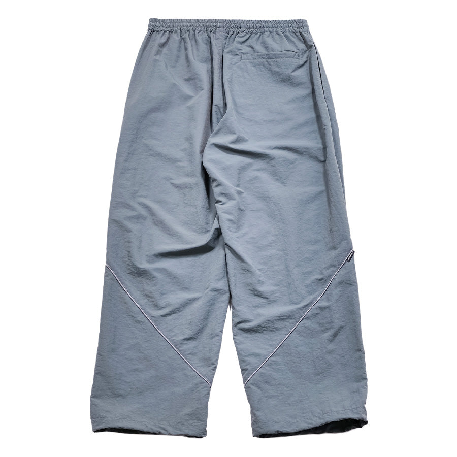 APPLEBUM ナイロントラックパンツ グレー 背面