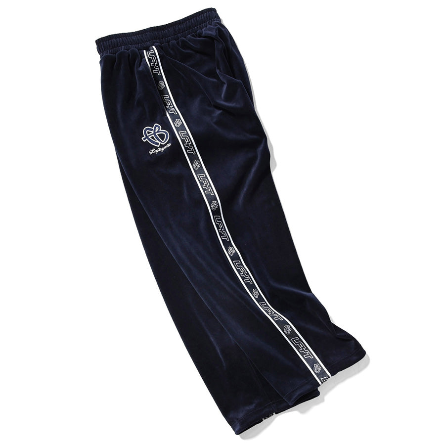LFYT × FUBU ( エルエフワイティー × フブ ) VELOUR TRACK PANTS