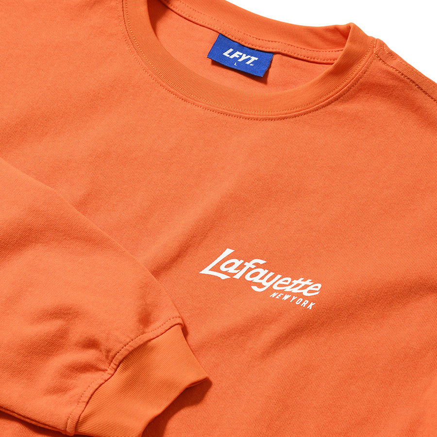 LFYT METRO SKYLINE L/S TEE ロングスリーブTシャツ オレンジ 左胸ロゴプリント 袖リブ LA260104