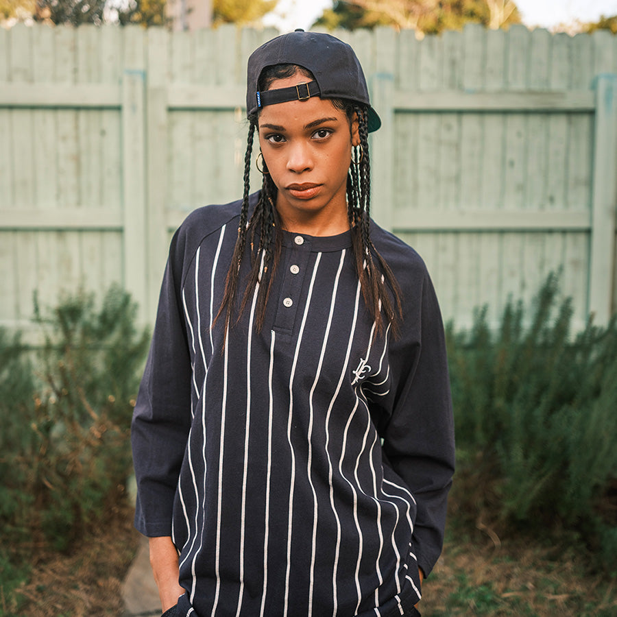 LFYT（エルエフワイティー） PINSTRIPE RAGLAN SLEEVE TEE ラグランT