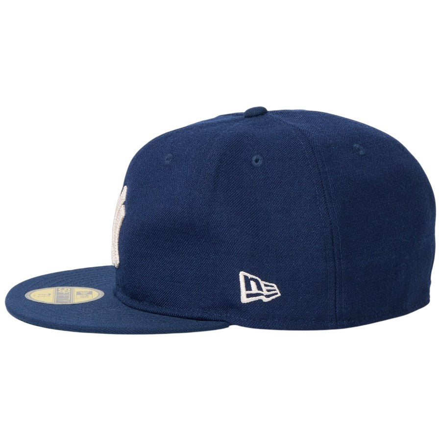 NEW ERA 59FIFTY Direction by Takayuki Ohashi Dog Patch ニューヨーク・ヤンキース オーシャンサイドブルー 右向き NEフラッグ刺繍 15171668